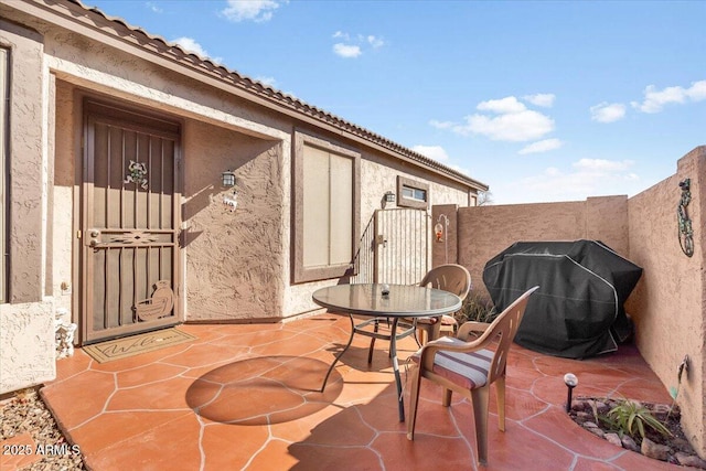 view of patio / terrace featuring a grill