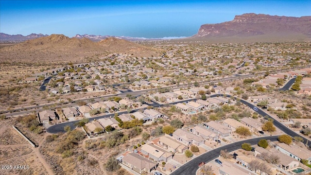 birds eye view of property with a mountain view