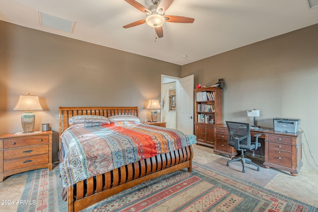 bedroom featuring visible vents and ceiling fan