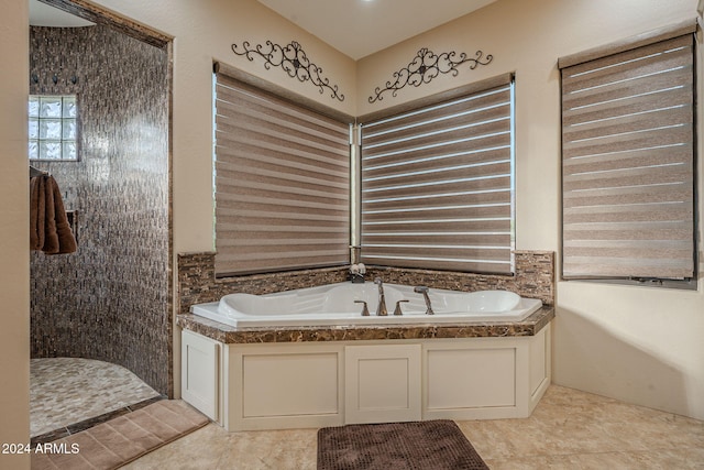 bathroom featuring a garden tub