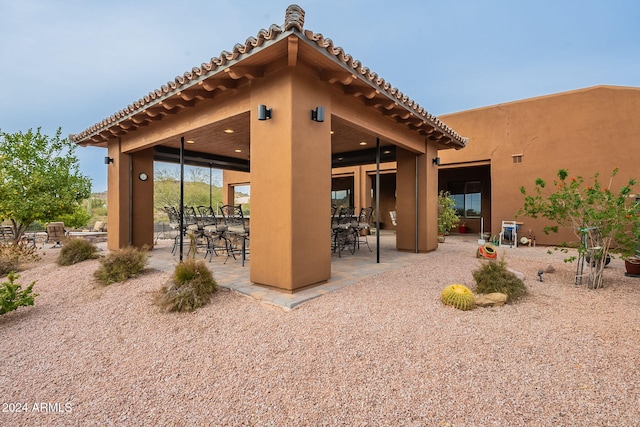 view of patio / terrace featuring a bar