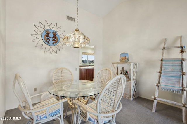 dining area featuring carpet floors