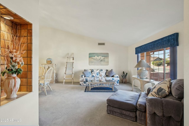 living room with lofted ceiling and carpet flooring