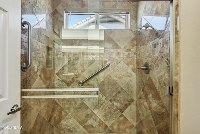 bathroom with an enclosed shower