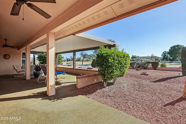 view of patio / terrace featuring ceiling fan