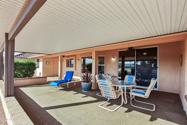 view of patio / terrace featuring ceiling fan