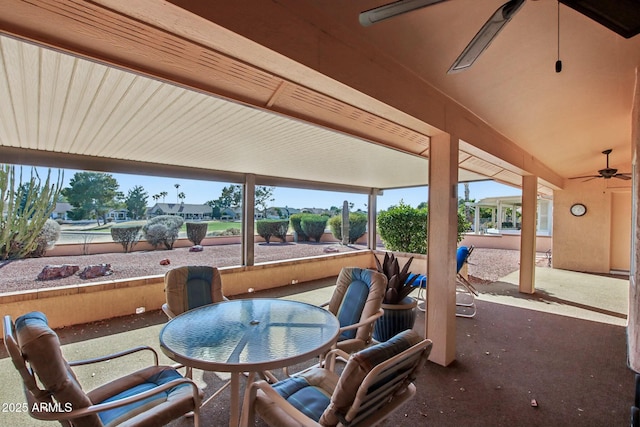 view of patio featuring ceiling fan