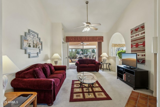 living room featuring vaulted ceiling and carpet