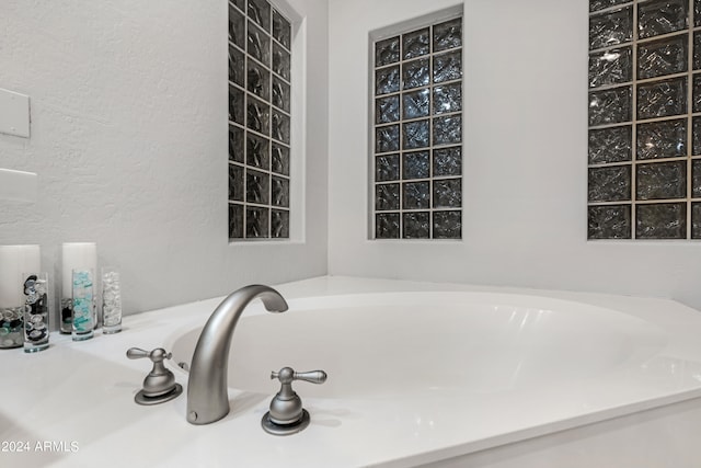 bathroom featuring a tub