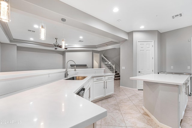 kitchen featuring recessed lighting, a sink, visible vents, light countertops, and a large island