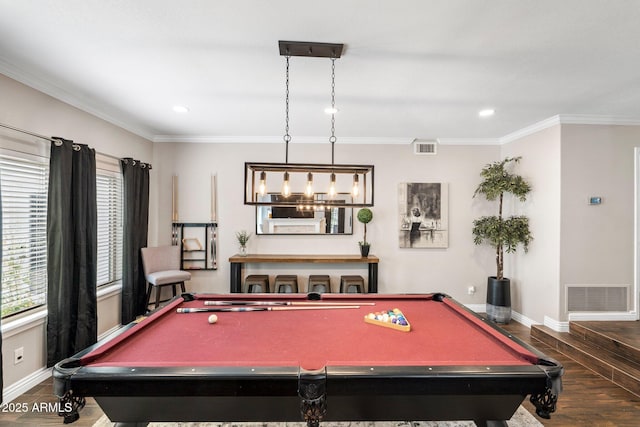 playroom with dark hardwood / wood-style flooring, pool table, and ornamental molding