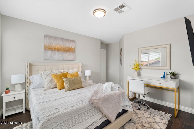 bedroom featuring dark wood-type flooring