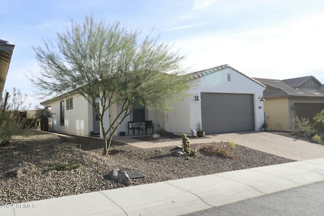 view of front of property featuring a garage