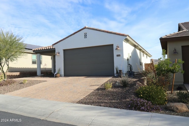 view of front of home with a garage