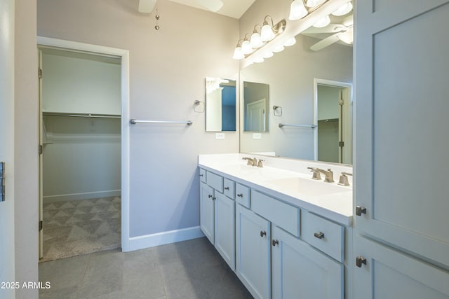 bathroom with vanity and ceiling fan