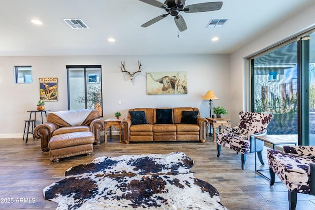 living room featuring ceiling fan