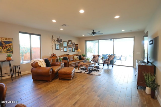 living room featuring ceiling fan