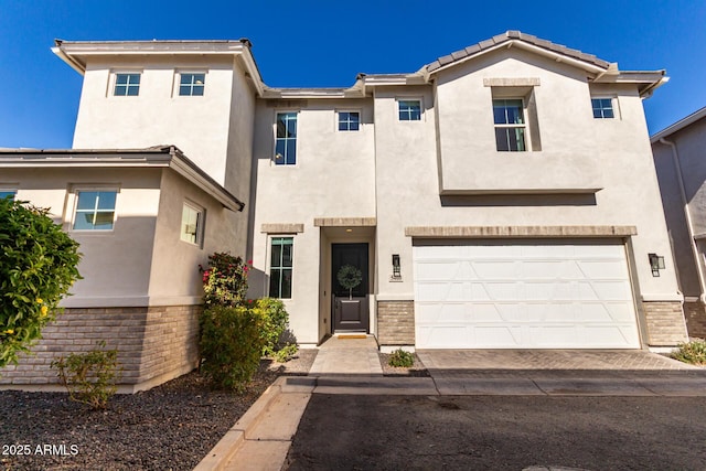 view of front of property with a garage