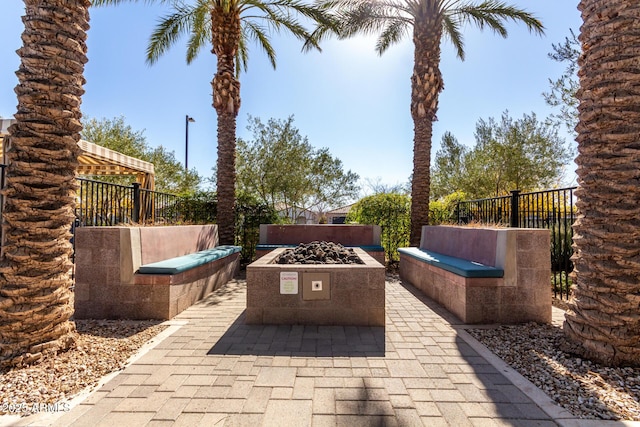 view of patio / terrace featuring a fire pit