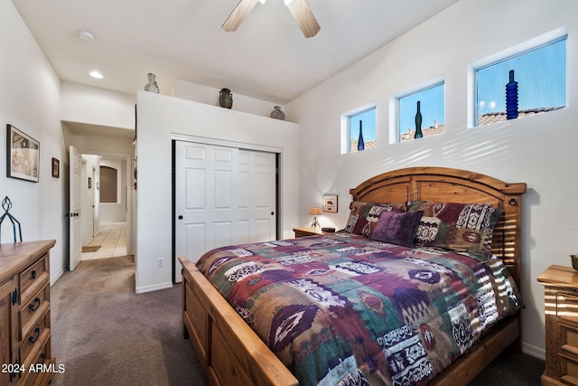 bedroom featuring carpet flooring, a closet, and ceiling fan