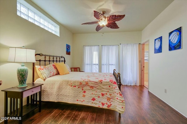 bedroom featuring dark hardwood / wood-style floors and ceiling fan