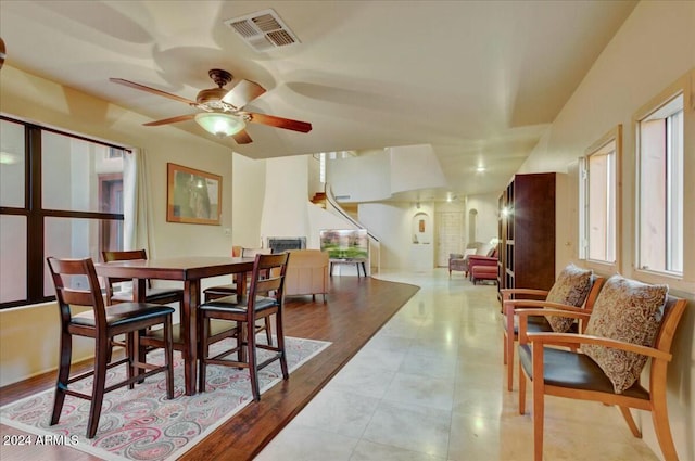 dining room featuring ceiling fan and light hardwood / wood-style floors