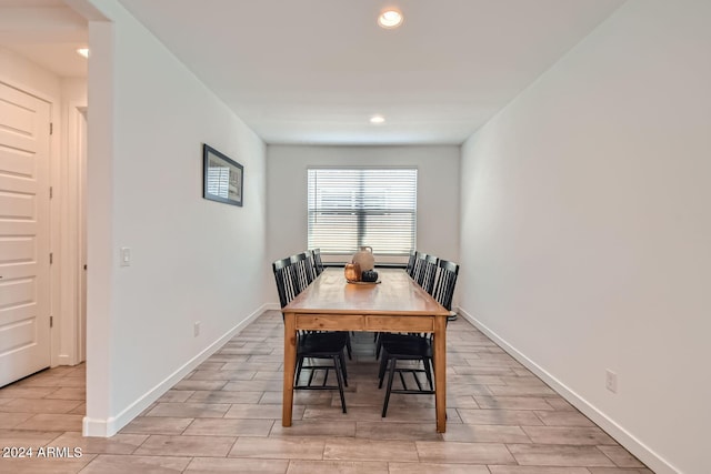 dining space featuring light hardwood / wood-style flooring