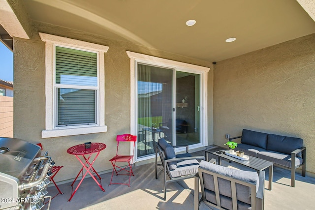 view of patio / terrace with area for grilling and an outdoor hangout area