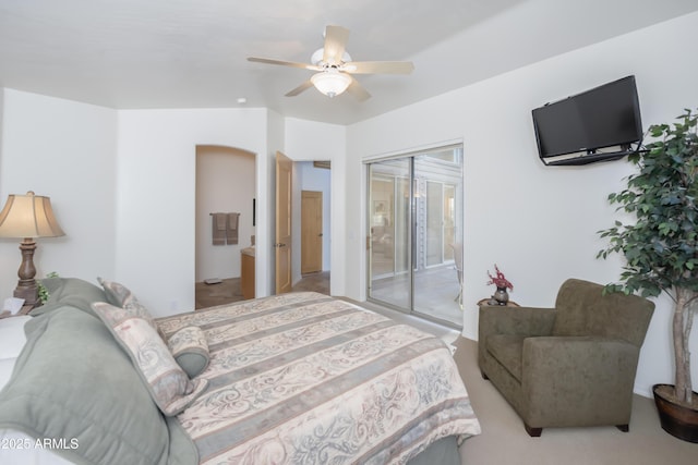 bedroom featuring ceiling fan and a closet