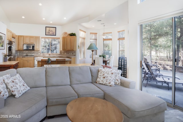 living area with plenty of natural light and recessed lighting