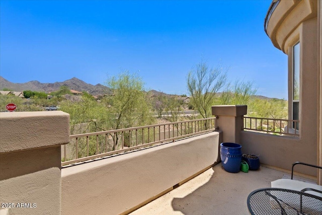 16420 N Thompson Peak Pkwy Unit 1002, Scottsdale, AZ 85260 - view of patio / terrace featuring a balcony and a mountain view
