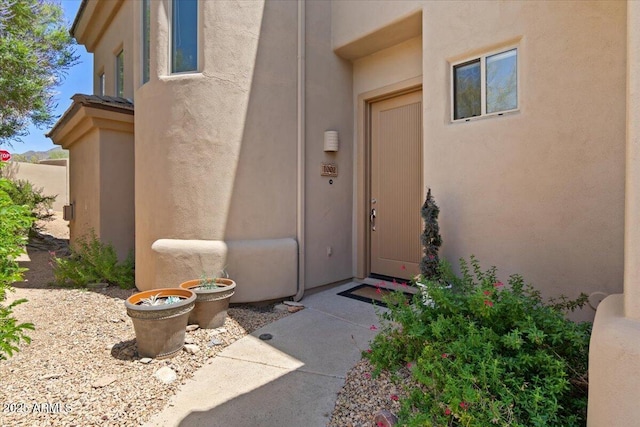 16420 N Thompson Peak Pkwy Unit 1002, Scottsdale, AZ 85260 - view of exterior entry featuring stucco siding