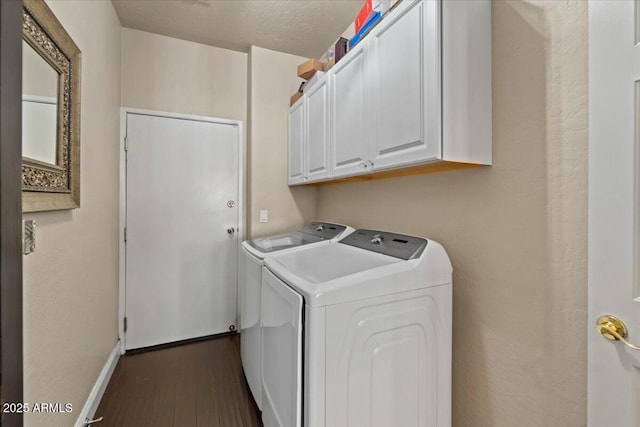 16420 N Thompson Peak Pkwy Unit 1002, Scottsdale, AZ 85260 - laundry area with independent washer and dryer, cabinet space, dark wood-style floors, and baseboards