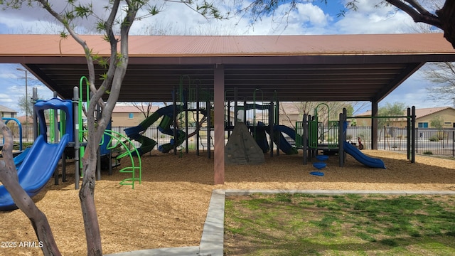 community jungle gym featuring fence