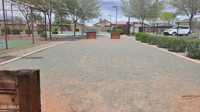 exterior space with fence and a residential view