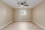 empty room featuring hardwood / wood-style flooring