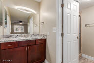 bathroom with vanity and an enclosed shower