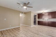 unfurnished living room with light hardwood / wood-style flooring