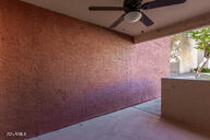 view of patio featuring ceiling fan