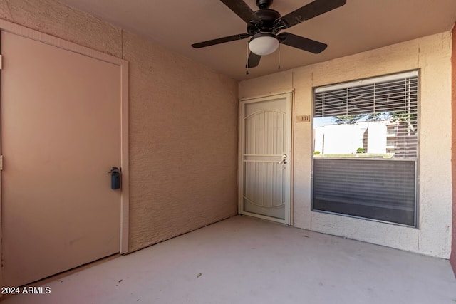 1340 N Recker Rd Unit 131, Mesa, AZ 85205 - doorway to property with a ceiling fan, stucco siding, and a patio