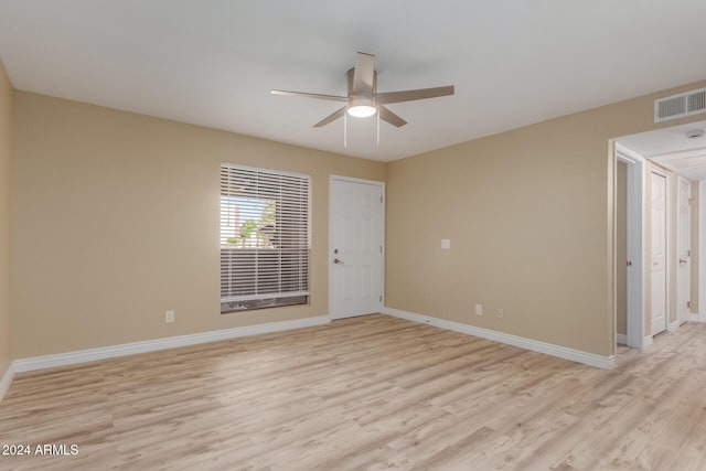 1340 N Recker Rd Unit 131, Mesa, AZ 85205 - unfurnished room featuring light wood finished floors, a ceiling fan, and baseboards