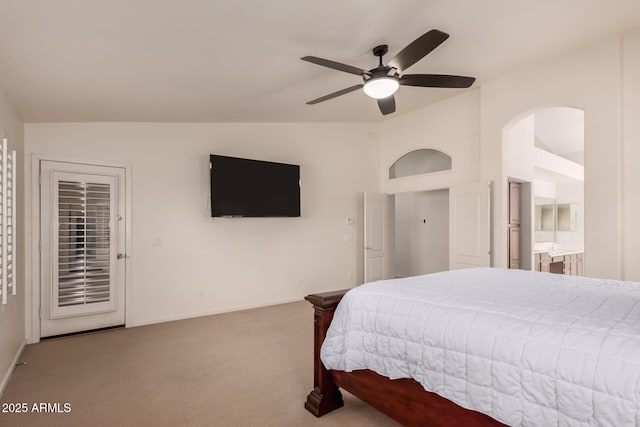 carpeted bedroom featuring baseboards, lofted ceiling, access to exterior, and a ceiling fan