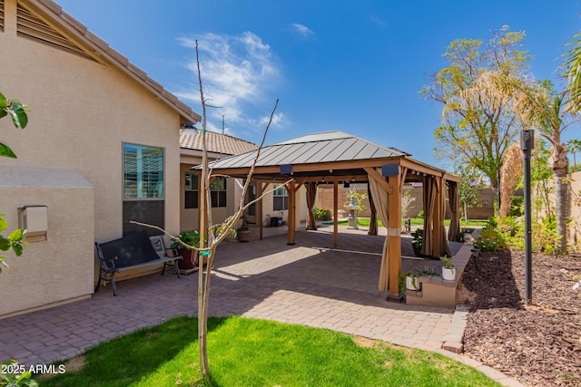 view of patio featuring a gazebo