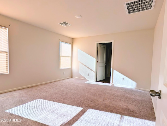 3760 N La Paz Dr, Eloy, AZ 85131 - unfurnished bedroom featuring baseboards, carpet flooring, and visible vents