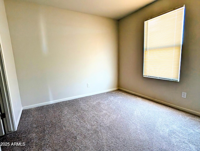 3760 N La Paz Dr, Eloy, AZ 85131 - carpeted empty room featuring baseboards