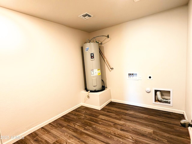 3760 N La Paz Dr, Eloy, AZ 85131 - laundry area featuring dark wood-style flooring, hookup for a washing machine, laundry area, hookup for an electric dryer, and electric water heater