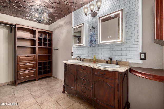 bathroom featuring tile patterned floors and vanity