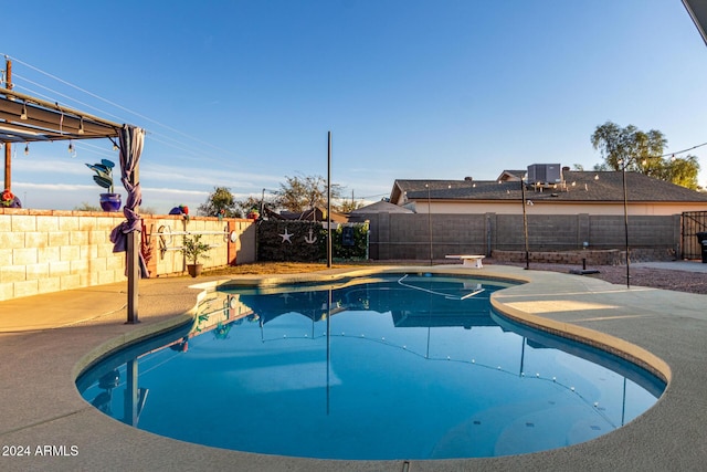 view of pool with a pergola, a patio area, and central AC