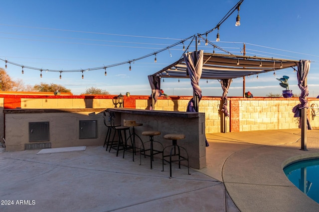 view of patio / terrace with exterior bar