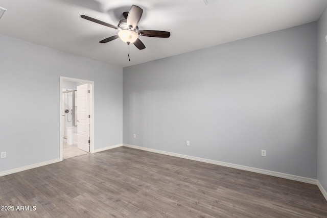 5550 N 16th St Unit 166, Phoenix, AZ 85016 - spare room with a ceiling fan and wood finished floors